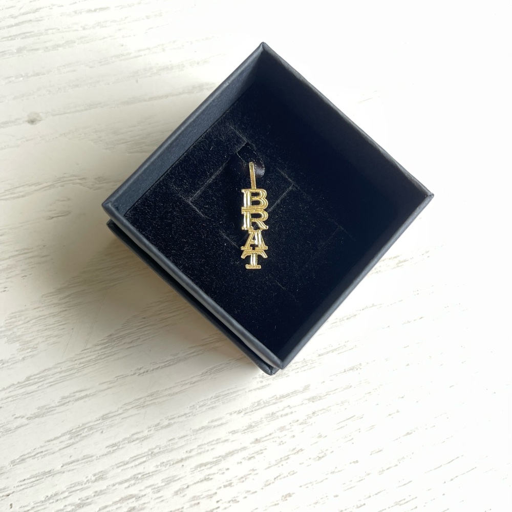 Vintage 14k yellow gold BRAT charm